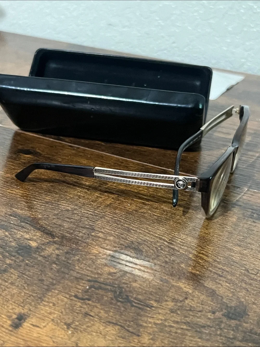 Versace Black Frame Sunglasses with Gold Temples